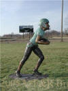 Boy Running with Football bronze sculpture
